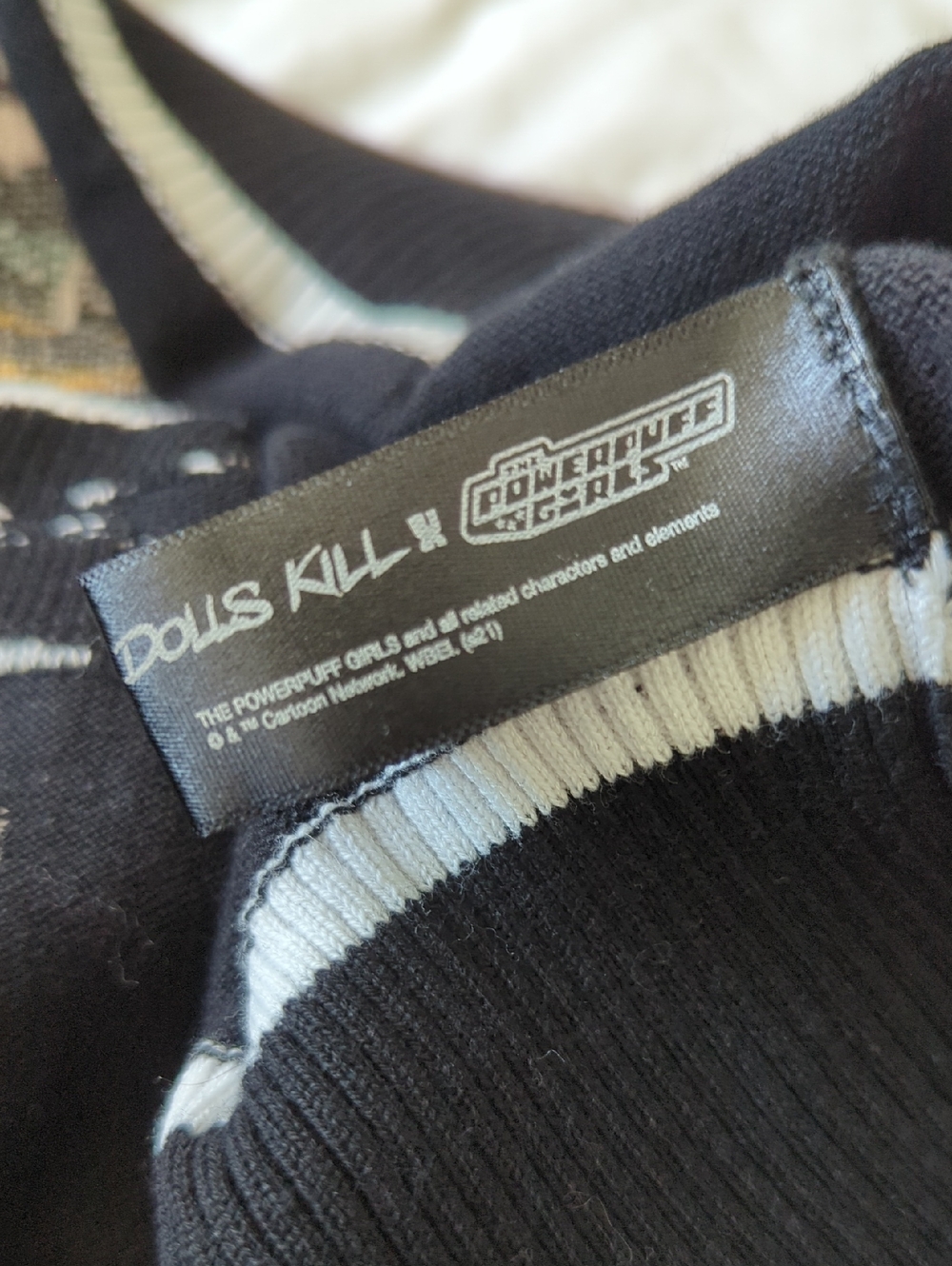 Dolls Kill x Powderpuff Black Cartoon And Flower Graphic Sweater - Picture 9 of 10